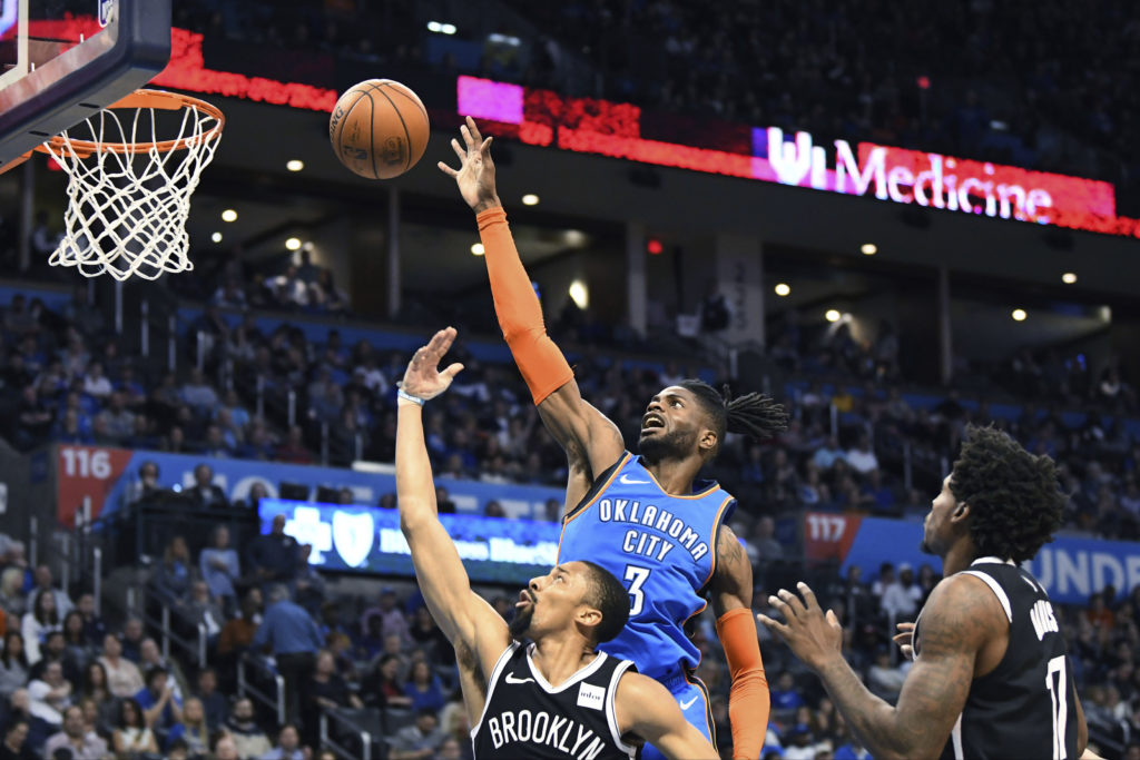 Nerlens Noel gets the jump on Spencer Dinwiddie’s bid for a Brooklyn basket, exemplifying how the playoff-proven Oklahoma City Thunder were just a bit ahead of the Nets throughout Wednesday night’s opener of this daunting seven-game road trip.(AP Photo/June Frantz Hunt)