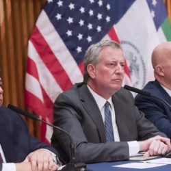 Crime in the city is down more than 10 percent so far this year, but murders have spiked in Brooklyn. Shown: Brooklyn District Attorney Eric Gonzalez, Mayor Bill de Blasio and Police Commissioner James O’Neill at Monday’s news conference. Photo by Michael Appleton, Mayor’s Office