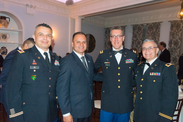 From left: Maj. Andres Gil, candidate for Queens DA Jose Nieves, Michael Farkas, vice president of the association, and Col. Luis Burgos. Eagle photo by Rob Abruzzese