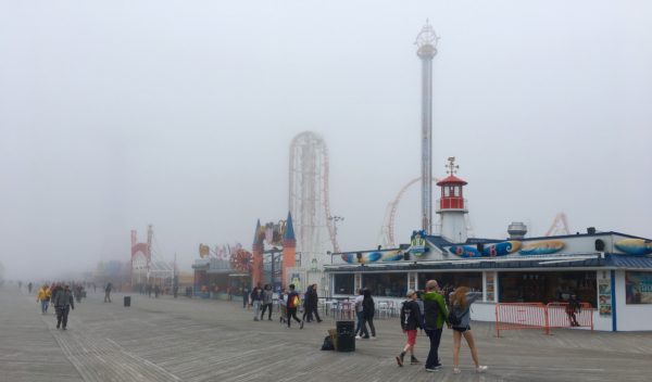 Back down on the ground, the fog on the Coney Island Boardwalk is pretty thick. Eagle photo by Lore Croghan