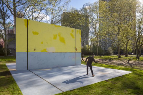 A park enthusiast plays handball on Ancart's work.  Photo: Nicholas Knight, Courtesy of Public Art Fund, NY