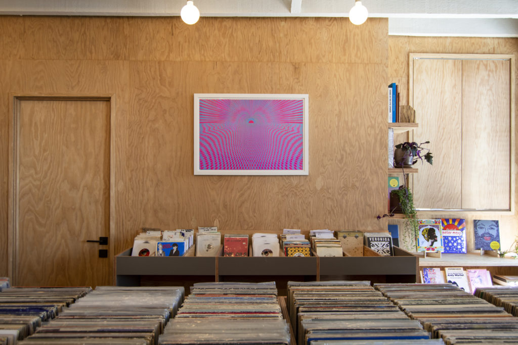 Natural light floods Brooklyn Record Exchange and artwork adorns the walls. Photo courtesy of Brooklyn Record Exchange