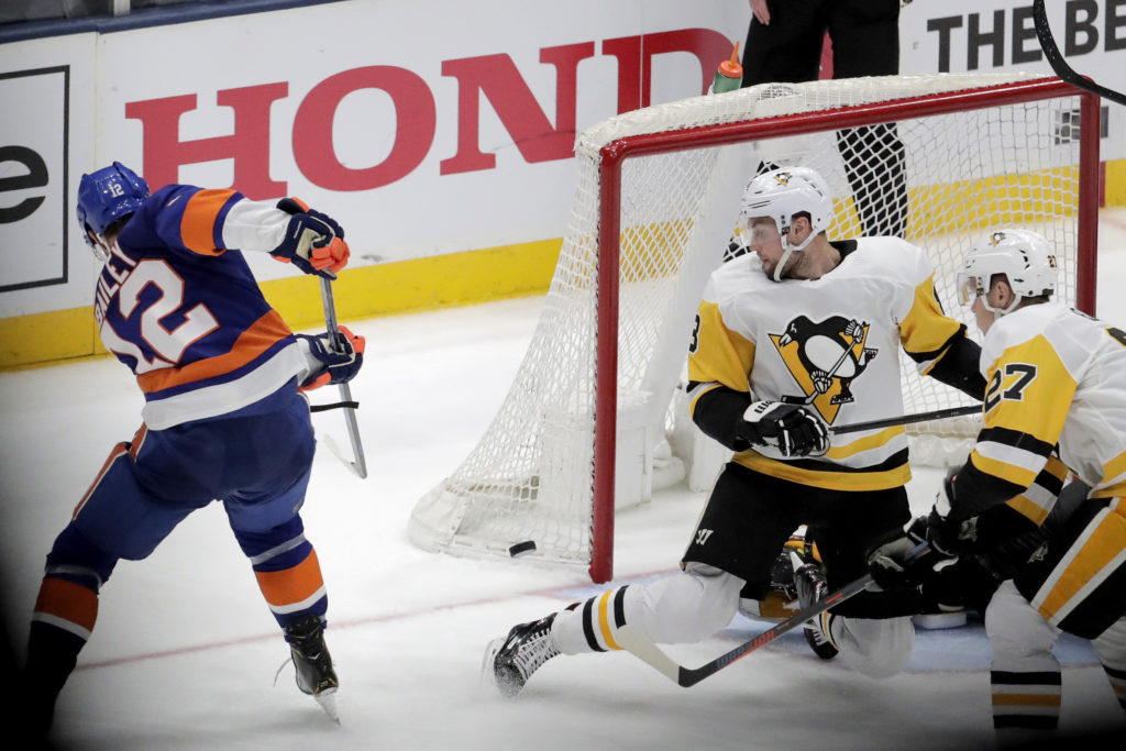 Denied by a post at the end of regulation, Josh Bailey sends the Nassau Coliseum into euphoria Wednesday night by netting the overtime game-winner against the Pittsburgh Penguins to give the Islanders a 1-0 lead in their best-of-7 first-round playoff series. (AP Photo/Julio Cortez)