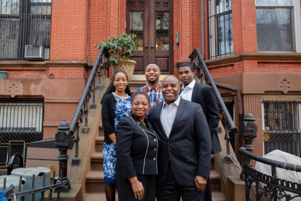 Ed King with his family, including his wife, Hon. Kathy J. King, a justice of the Supreme Court, Civil Term, in front of their Bed-Stuy home. Photo courtesy of Ed King