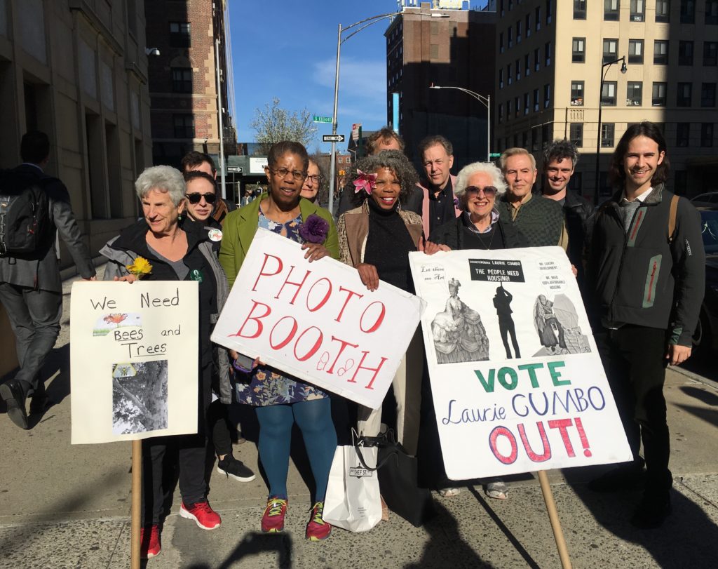 Protestors (left to right) Lucy Koteen, Julia Bryant, Alicia Boyd and Sandy Reiburn hold signs outside City Councilmember Laurie Cumbo’s Fort Greene office. Eagle photo by Lore Croghan