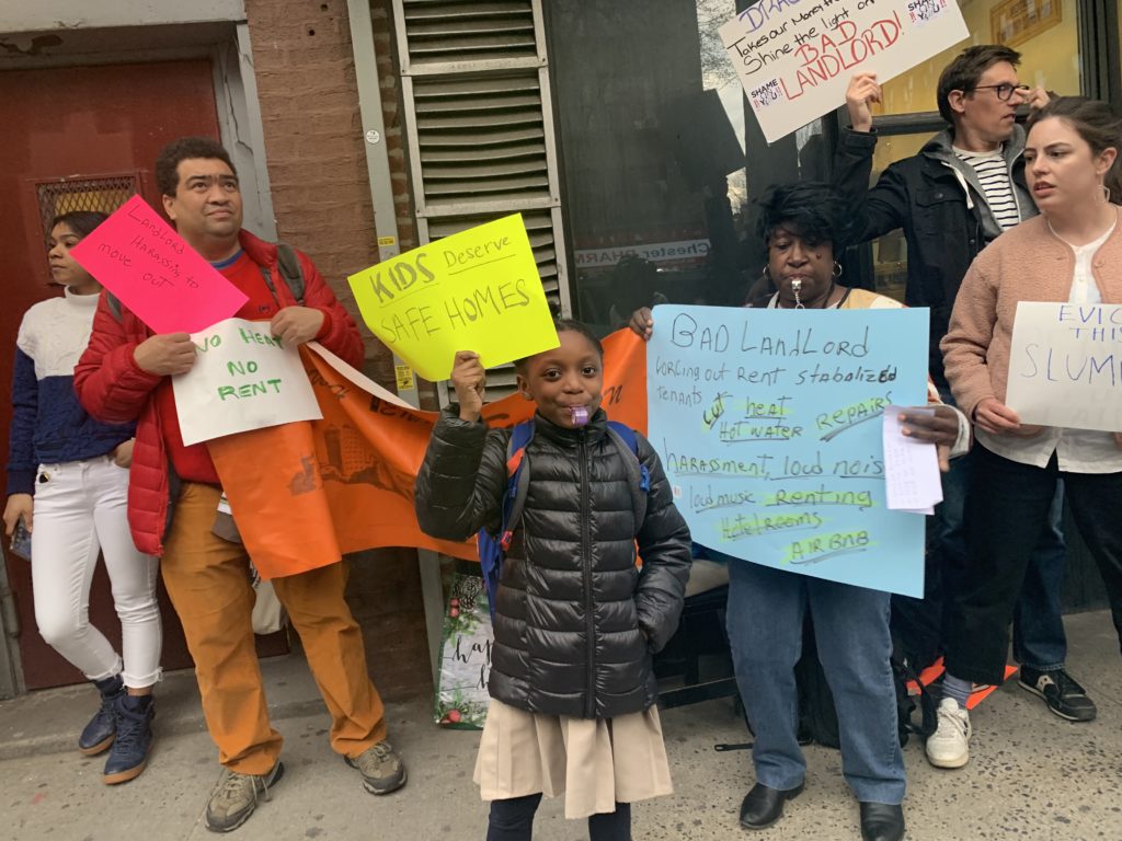 Protesters gathered outside apartments in Prospect Lefferts Gardens where tenants allege the landlords are harassing them. Eagle photo by Noah Goldberg.
