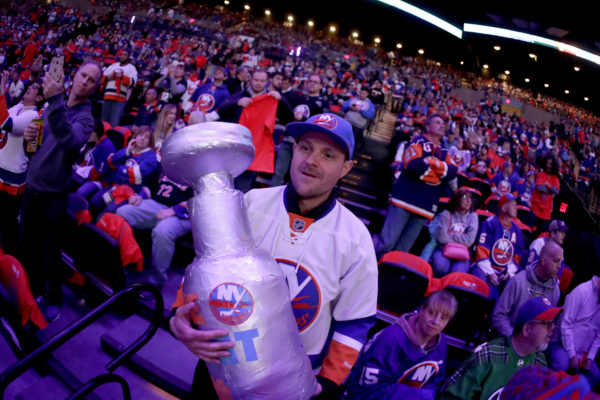 If Islander fans wish to see their team hoist its fifth Stanley Cup this spring, they’ll likely have to do it at Downtown’s Barclays Center, where New York will play its home games if it manages to sneak past Pittsburgh in the opening round. (AP Photo/Julio Cortez)