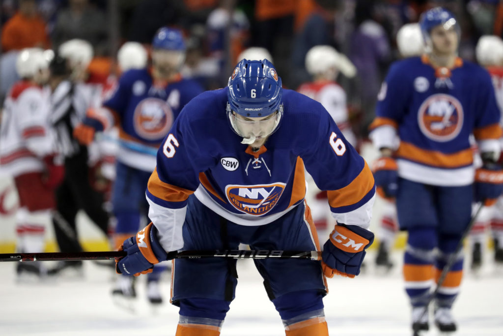 Defenseman Ryan Pulock and the rest of the Islanders were left deflated following two excruciating home losses to the Carolina Hurricanes in Downtown Brooklyn this past weekend. (AP Photo/Julio Cortez)
