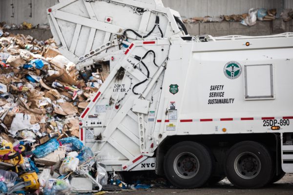 Department of Sanitation trucks dump Brooklyn’s recyclables into the Tipping Room.