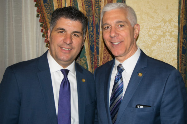Dominic Famulari (left), president of the Catholic Lawyers Guild, and Dino Mastropietro. Eagle photo by Rob Abruzzese