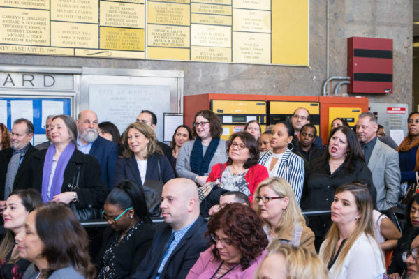Court employees plus many members of the Columbian Lawyers Association crowded the lobby of the Kings County Supreme Court, Civil Term, to watch the Employee of the Year ceremony. Eagle photo by Rob Abruzzese