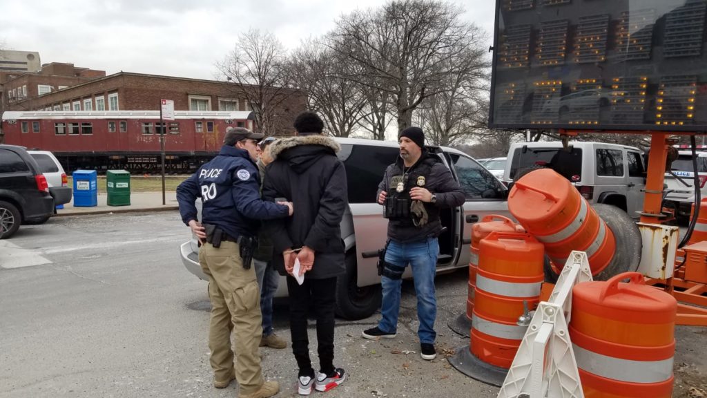 ICE agents arrest an immigrant outside Queens Criminal Courthouse in January. Photo obtained by the Eagle