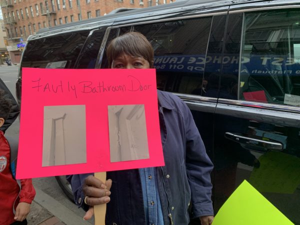 Gretelle Phillips said she was asked by her landlord, William Shasho, "When are you going back to Barbados," despite living in the same Brooklyn building for 39 years. Eagle photo by Noah Goldberg.