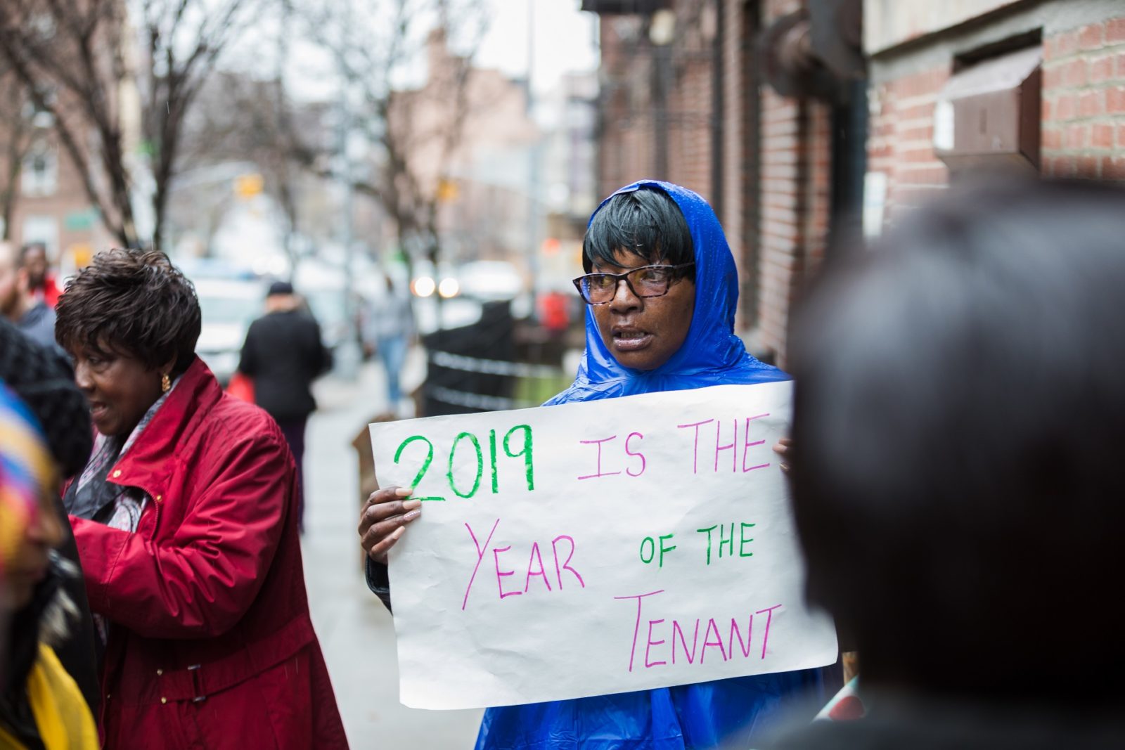 A Crown Heights tenant at an April protest. Eagle file photo by Paul Frangipane