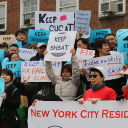 Advocates rallied ahead of a public forum earlier this month at Queens Borough Hall to discuss segregation at the city's elite specialized high schools. Photo via Christina Veiga/Chalkbeat