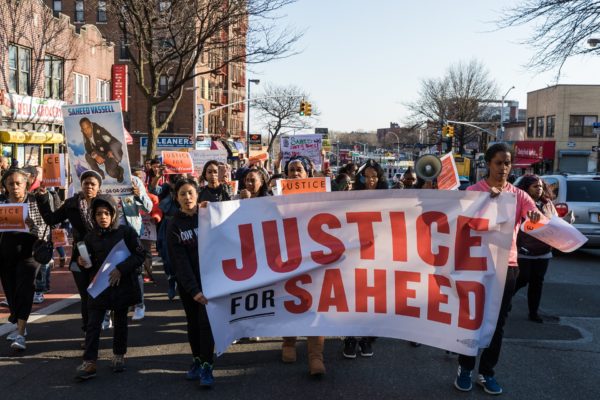 Demonstrators marched up Utica Avenue to Eastern Parkway. Eagle photo by Paul Frangipane