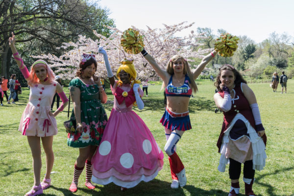 That’s Charles Battersby in a cheerleader’s uniform with a cohort of cosplayers. Eagle photo by Paul Frangipane