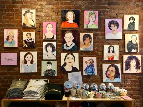 Portraits of iconic feminists by artist Jenny Belin adorn the wall at Fifth Avenue shop Diana Kane. Eagle photo by Lore Croghan