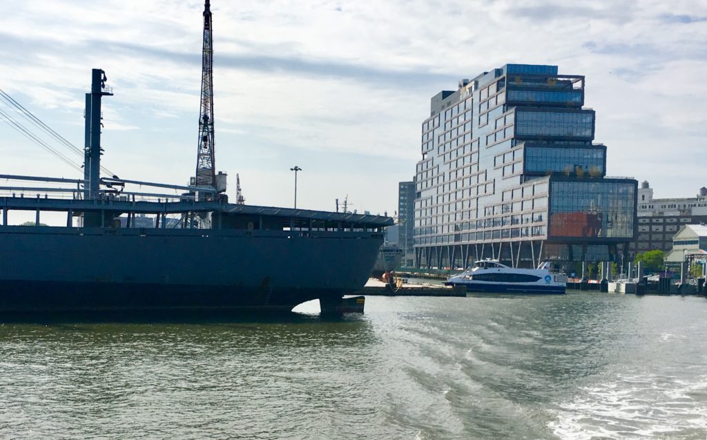 A ferry floats outside Dock 72, a new office building at the Brooklyn Navy Yard. Eagle photo by Lore Croghan