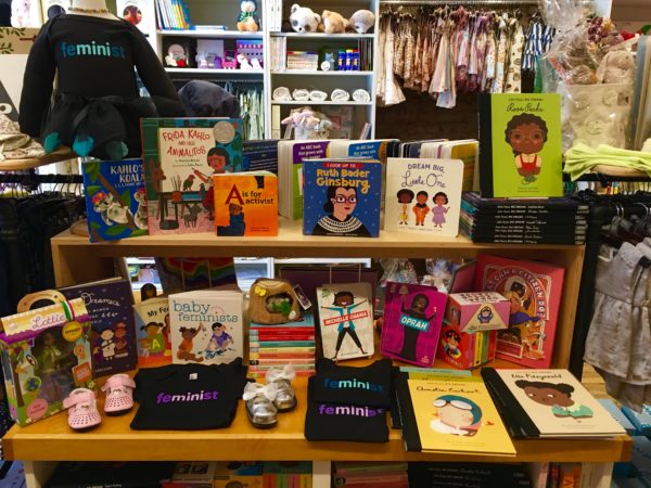 This display table at LuLu’s For Baby is devoted to feminist-themed gifts. Eagle photo by Lore Croghan