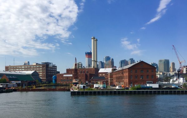  Historic Navy Yard buildings and modern Downtown Brooklyn towers mingle in this view from a ferry-boat deck. Eagle photo by Lore Croghan