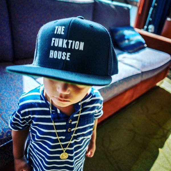 A young fan shows off his support for Funktion House. Photo courtesy of Funktion House