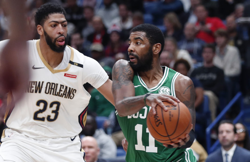 Anthony Davis and Kyrie Irving could be headed to Brooklyn if the Nets can orchestrate a blockbuster swap for the New Orleans center before signing the Boston guard via free agency. AP Photo by Gerald Herbert