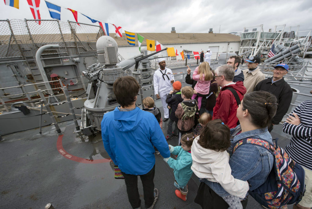 Electronics Technician 3rd Class Samuel Gordon conducts a Memorial Day tour of the guided-missile cruiser USS San Jacinto in Brooklyn during Fleet Week New York 2017. U.S. Navy photo by Mass Communication Specialist 2nd Class Cole Keller