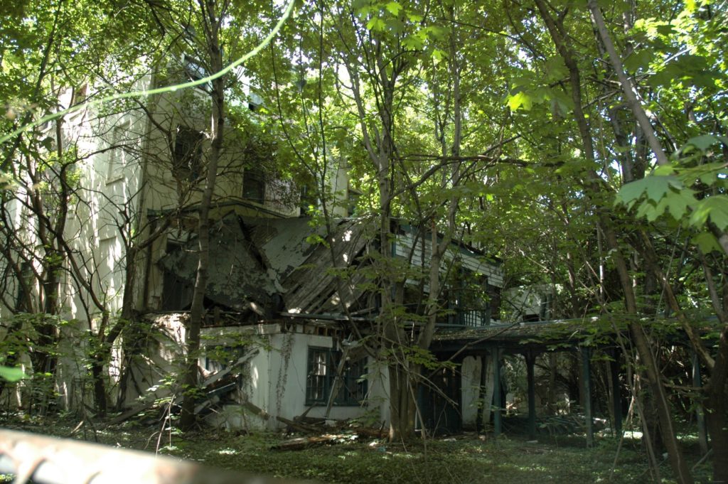 This 2005 photo shows an abandoned but beautiful Admiral’s Row house. Eagle file photo by Sarah Ryley