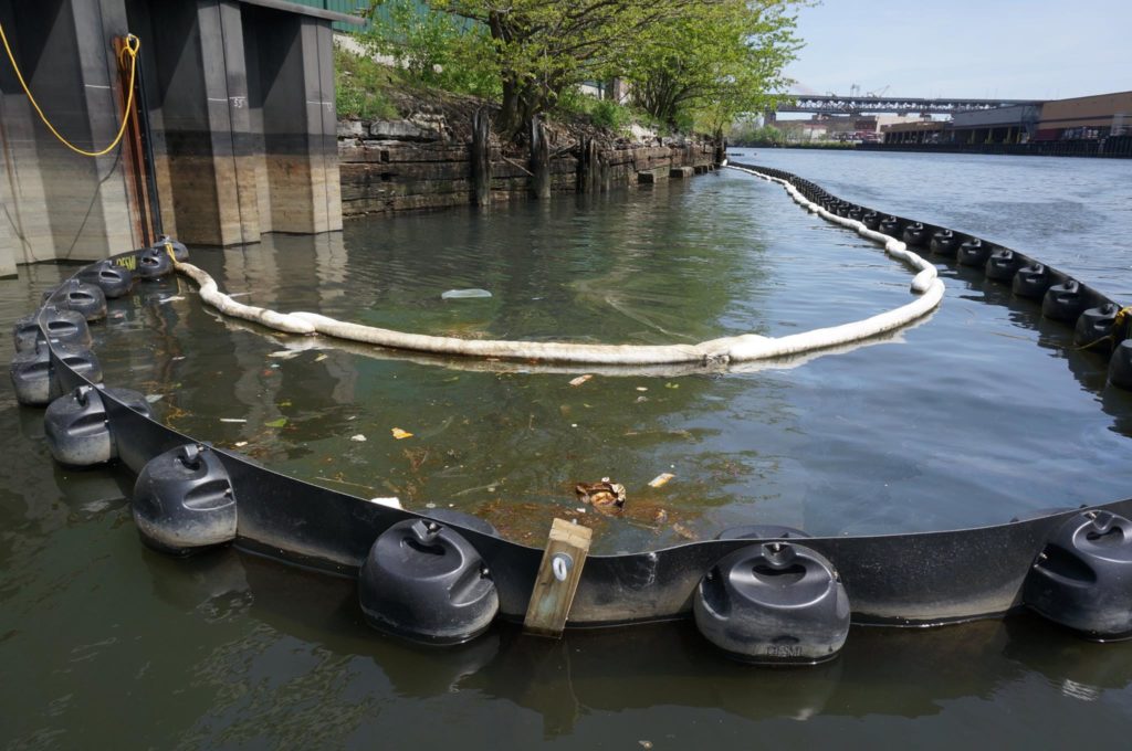 Two layers of booms help to contain oil from entering the main body of Newtown Creek and eventually New York Harbor. Photo courtesy of Newtown Creek Alliance