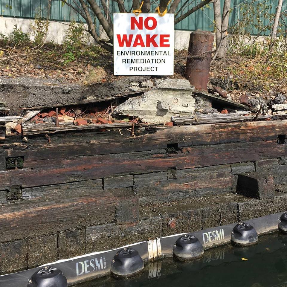 Newtown Creek Alliance was succesful in pushing NYSDEC to install "No Wake" signs to prevent oil from entering the creek from the quarantined areas. Photo courtesy of Newtown Creek Alliance