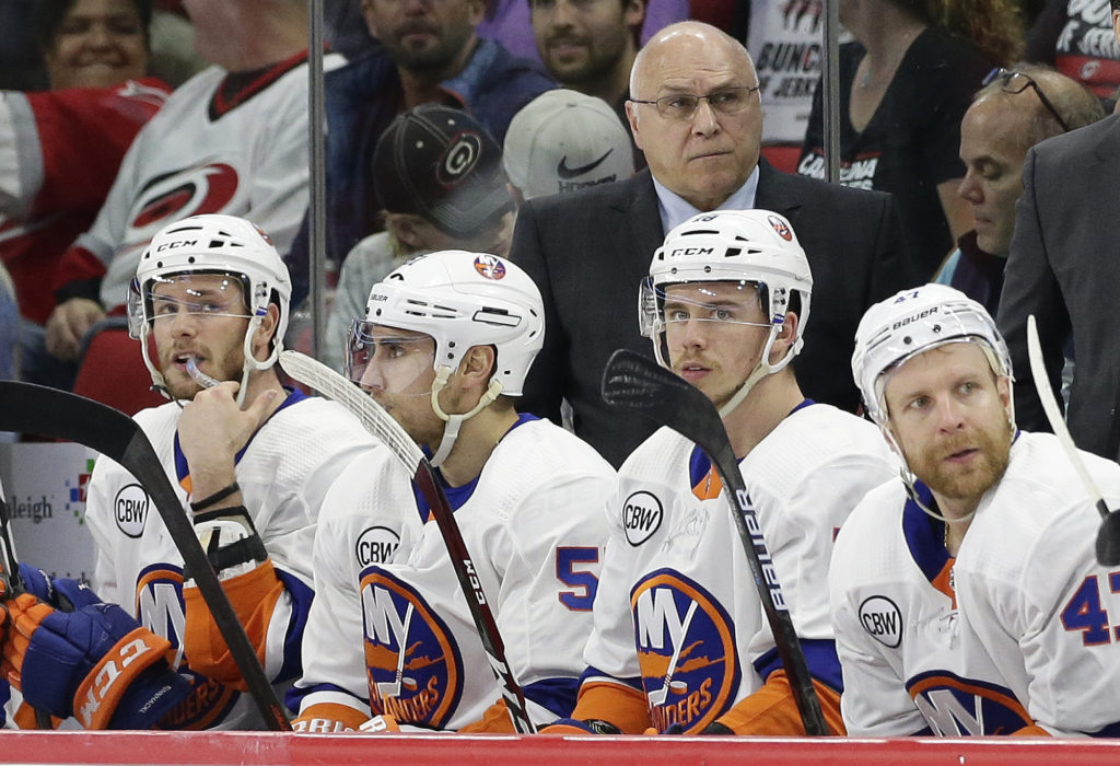 Head coach Barry Trotz and the rest of the New York Islanders are one loss away from elimination entering Friday night’s do-or-die Game 4 of the Eastern Conference semifinals in Carolina.(AP Photo/Gerry Broome)