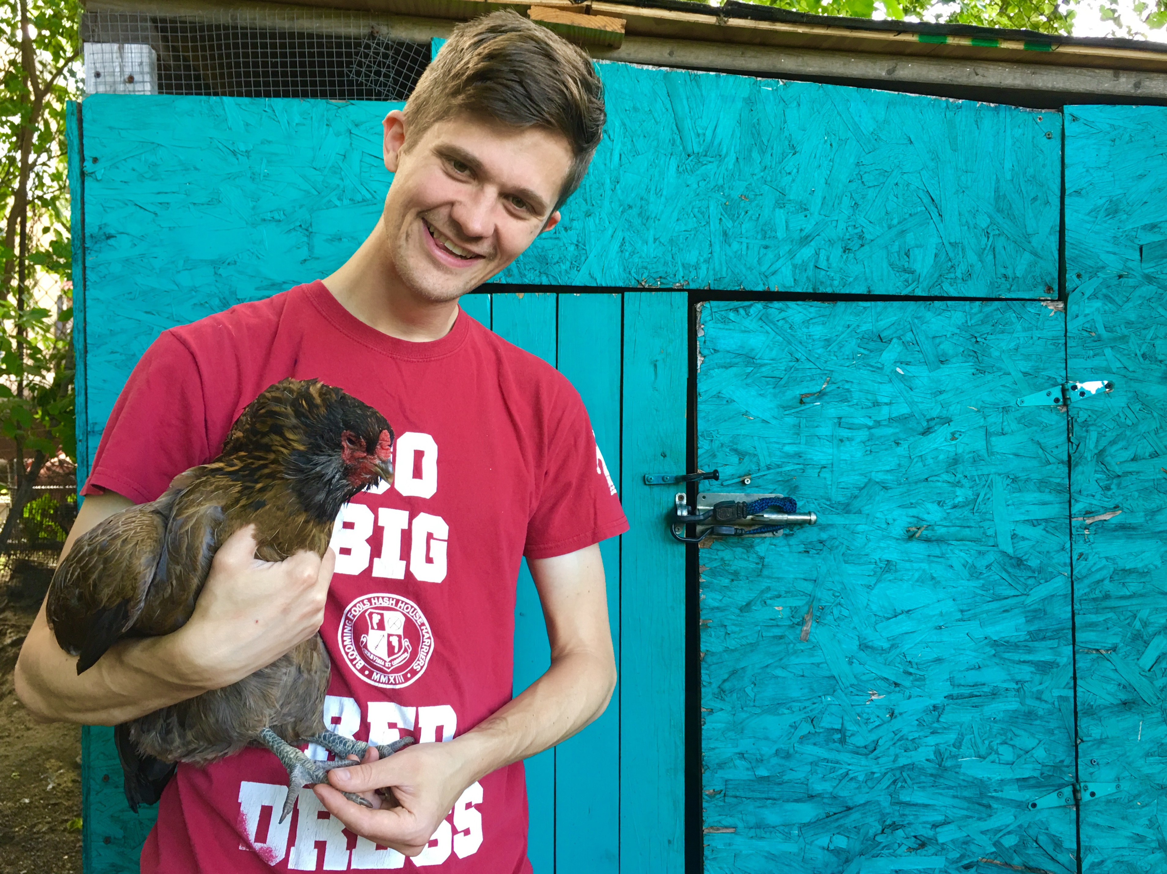 Another lead chicken keeper, Robert Callahan, holds a chicken named Miss Magoo. Eagle photo by Lore Croghan