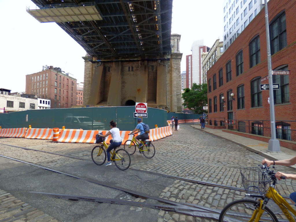 The final phase of a $20 million street, water and sewer renovation plan has begun in DUMBO, but the DUMBO Neighborhood Association, a local preservation group, worries that proper care will not be taken with the area’s historic Belgium block pavers. Eagle photo by Mary Frost
