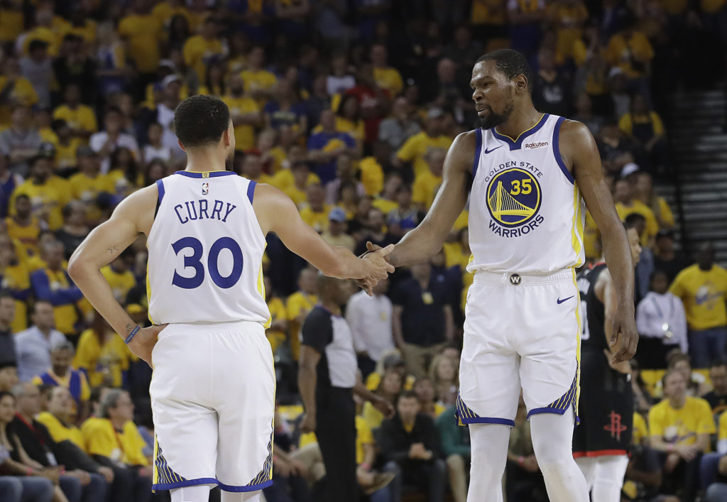 Days away from free agency, Warriors superstar Kevin Durant is likely leaving Stephen Curry and the rest of his Golden State teammates for the Big Apple, be it here in Downtown Brooklyn or across the East River. (AP Photo/Jeff Chiu)