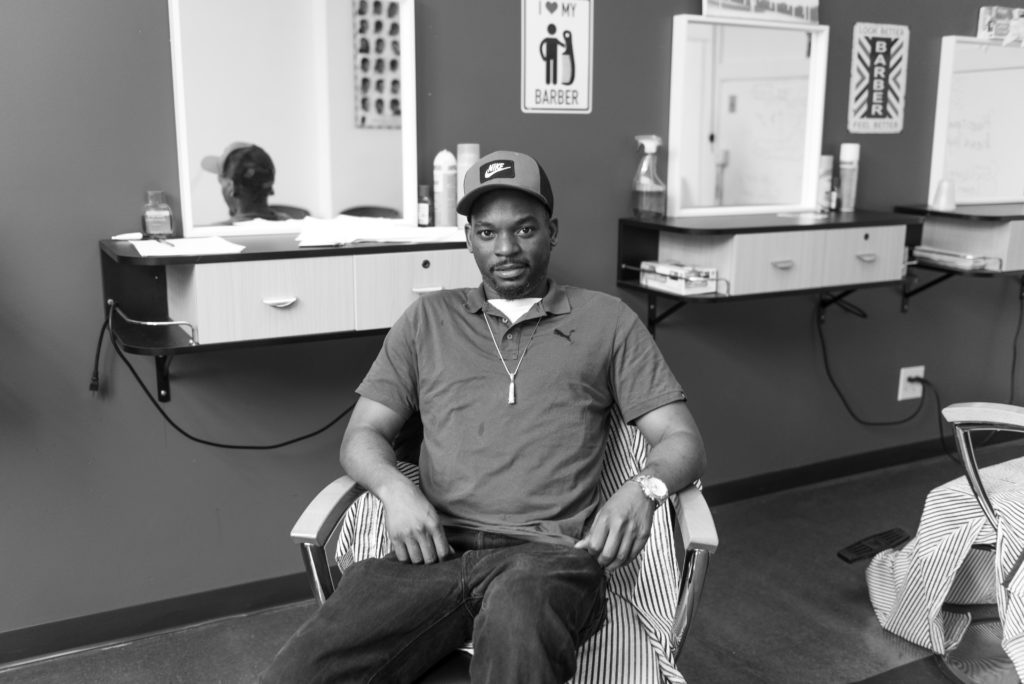 Christopher Workman, the master barber in charge of the program. Eagle photo by Paul Stremple