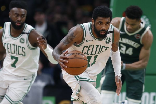 Boston guard Kyrie Irving is reportedly interested in signing with the Nets as a free agent and was also rumored to be recruiting Golden State’s Kevin Durant to do the same. (AP Photo/Michael Dwyer)