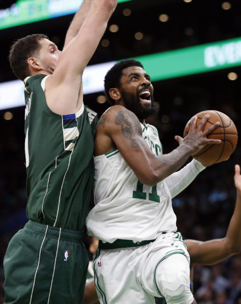 Boston star Kyrie Irving could be headed to Brooklyn this summer, but would that mean the departure of D’Angelo Russell or the forming of a new one-two backcourt punch at Barclays Center? (AP Photo/Michael Dwyer)