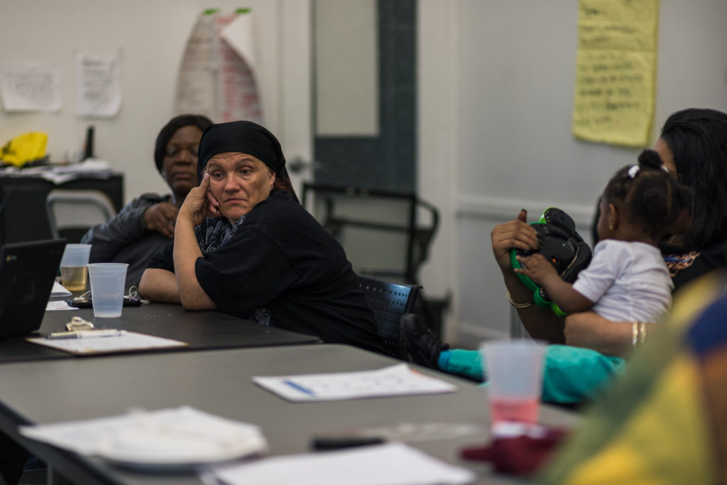 Residents meet weekly at the Red Hook Initiative to discuss issues dealing with their housing. At left, resident Betty Bernhart. Eagle photo by Paul Frangipane