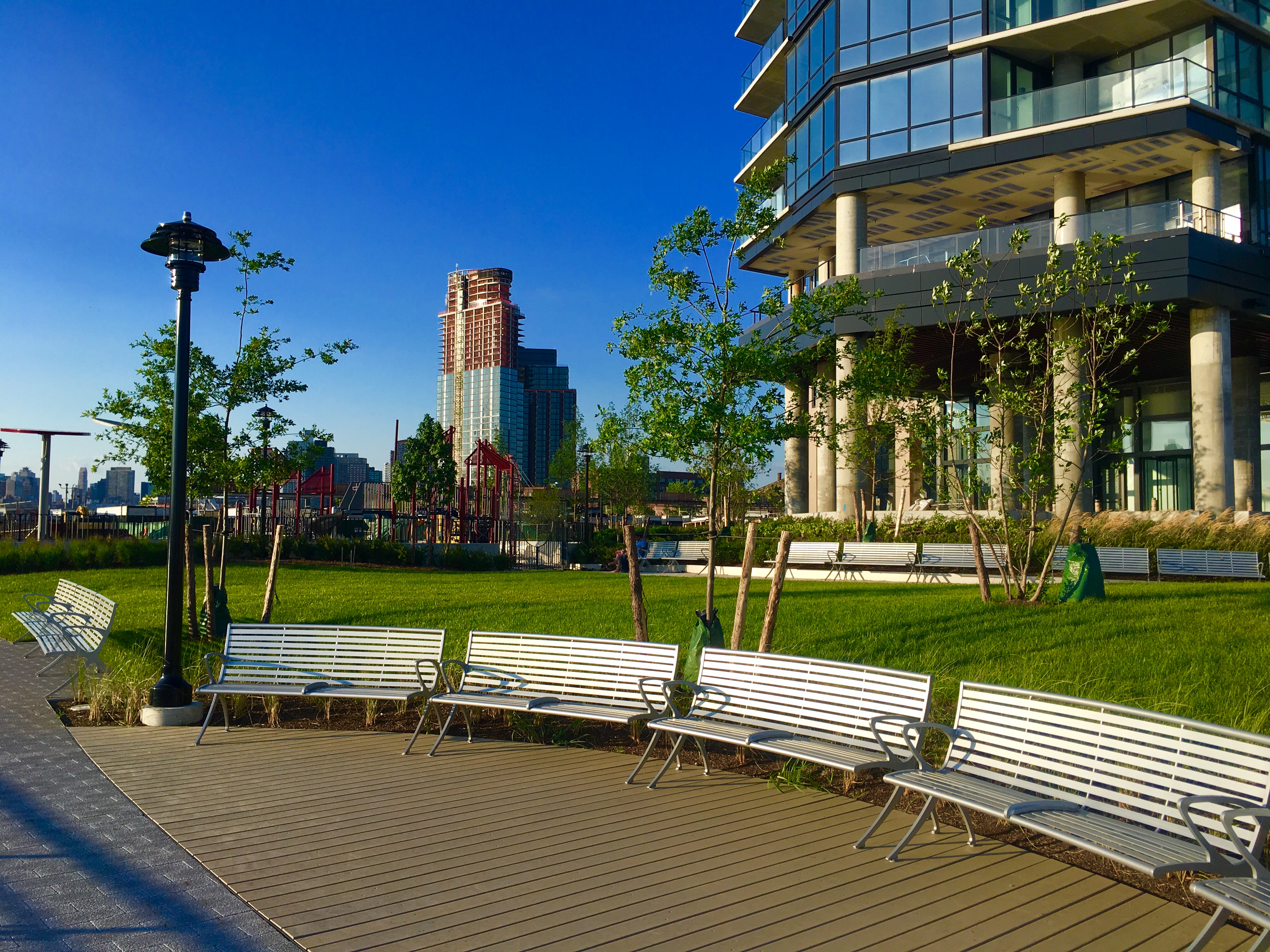 This appealing public waterfront space is located in front of a residential tower called The Greenpoint. Eagle photo by Lore Croghan