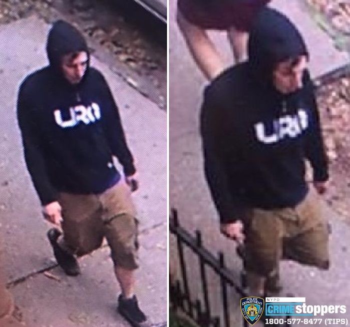 Police released surveillance image of a man who stole $40,000 from a parked Jeep in Brooklyn Heights. Photo via NYPD