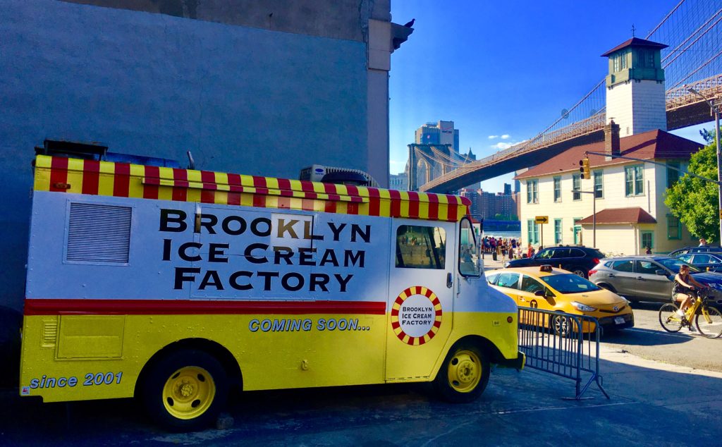 Brooklyn Ice Cream Factory plans to put a scoop shop where its truck is parked. The white building is its former home — which is now occupied by Ample Hills Creamery. Eagle photo by Lore Croghan