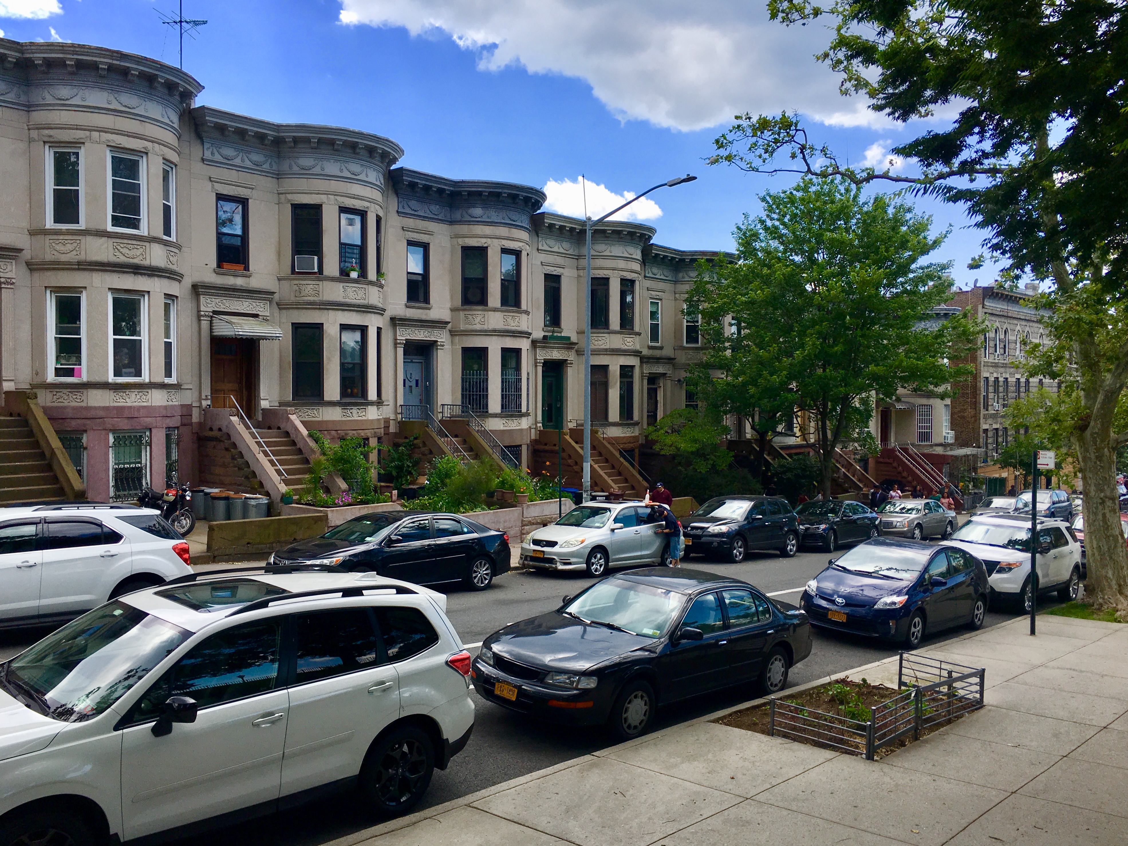 The rowhouses and apartment buildings in the Sunset Park North Historic District are right across the street from the park called Sunset Park. Eagle photo by Lore Croghan