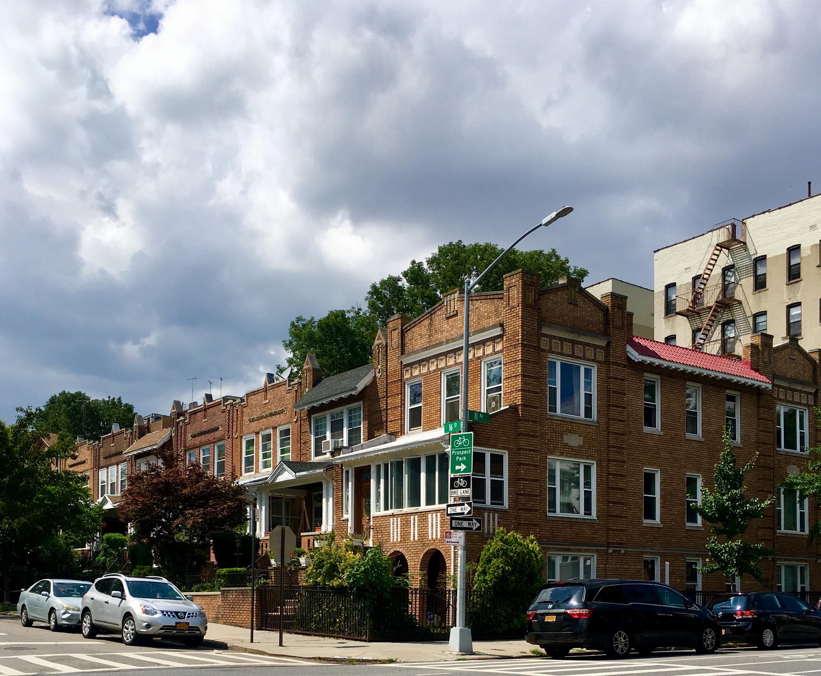 Clouds add drama to this Windsor Terrace streetscape. Eagle photo by Lore Croghan