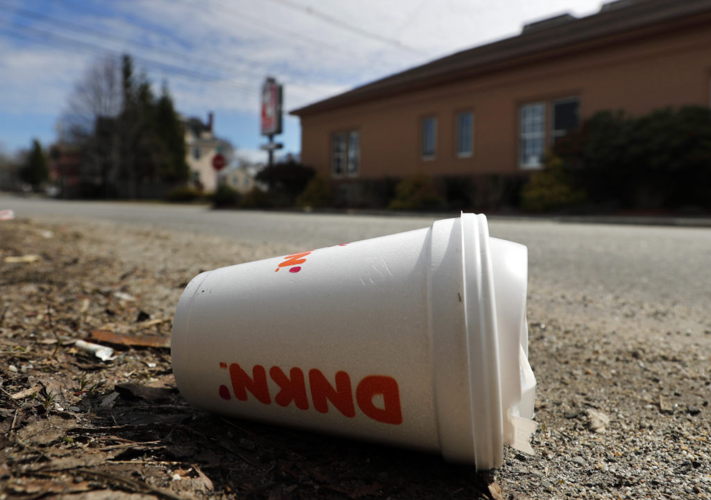 A coffee cup made from polystyrene foam, commonly known as Styrofoam, lies on the side of a road. AP Photo/Robert F. Bukaty