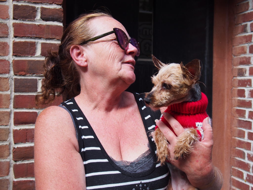 Kathie Brewster, 55, has been separated from her dog, Pinks, while living in a New York City homeless shelter for the past two years. The pair could be reunited through “co-sheltering” legislation from City Council Member Stephen Levin. Eagle photo by Emma Davis