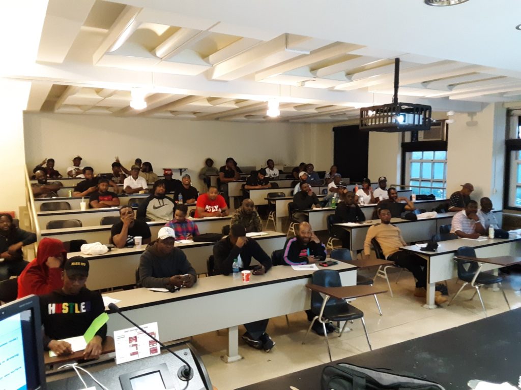 Students during a HAC construction training session. Photo courtesy of The Haitian American Caucus
