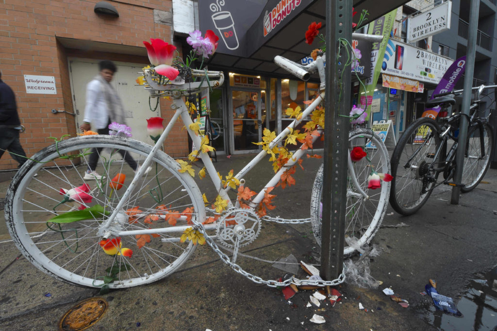 Ghost bikes across the city mark the sites where cyclists have been killed. Eagle file photo by Todd Maisel
