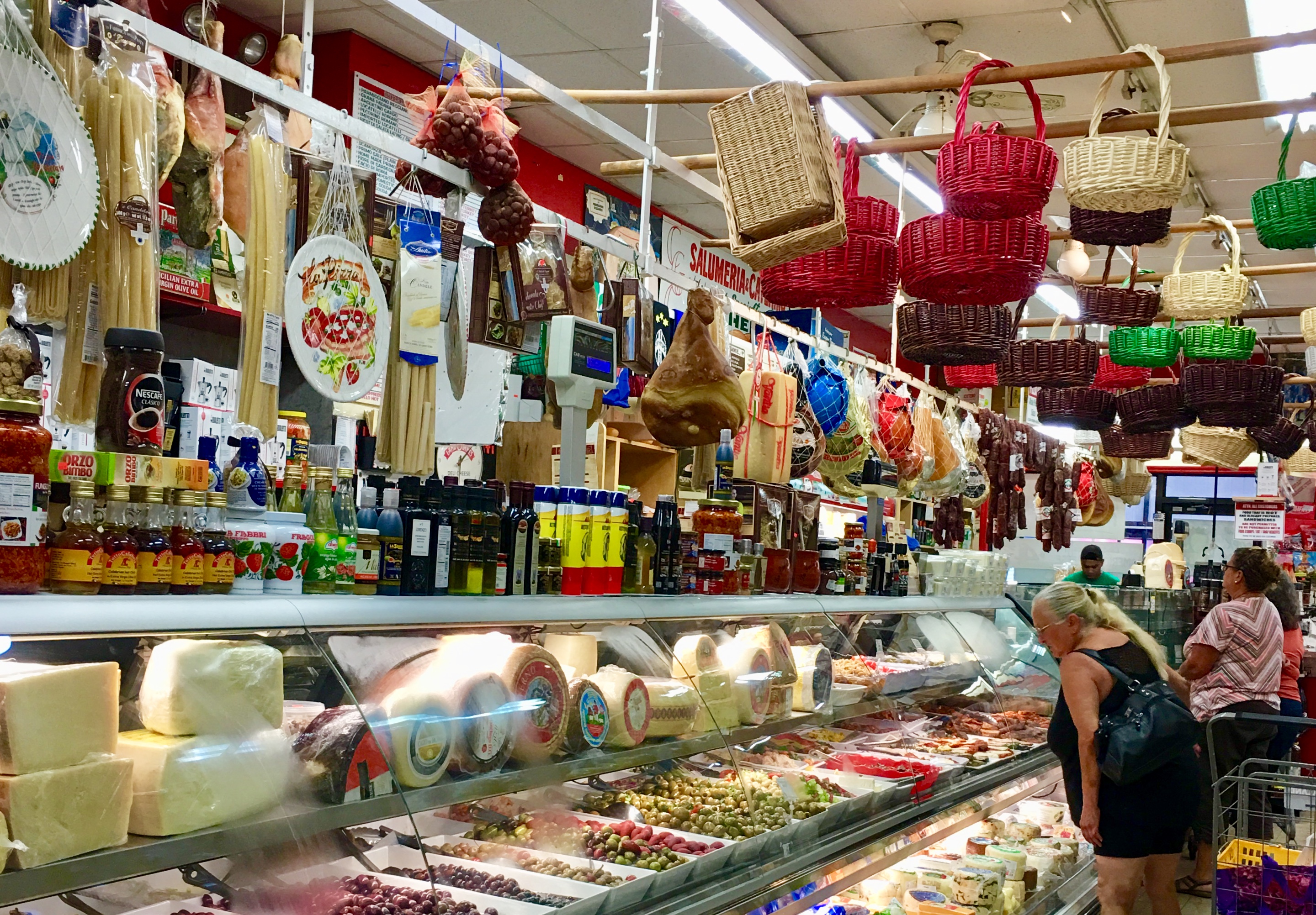 Here’s a glimpse of the olive and cheese selections at Frank & Sal Prime Meats. Eagle photo by Lore Croghan