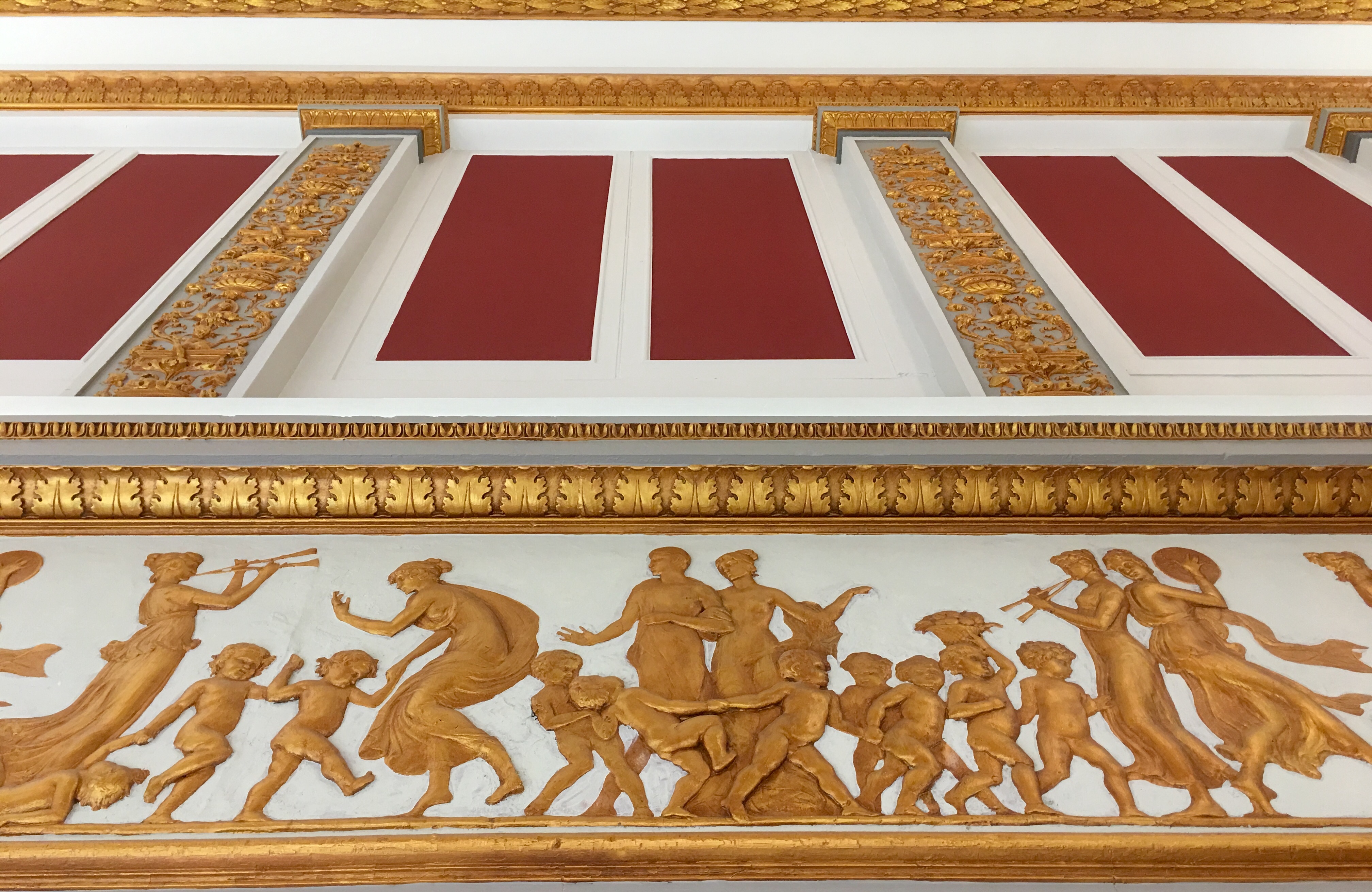 Dancing figures adorn a frieze inside the 18th Avenue Target. Eagle photo by Lore Croghan